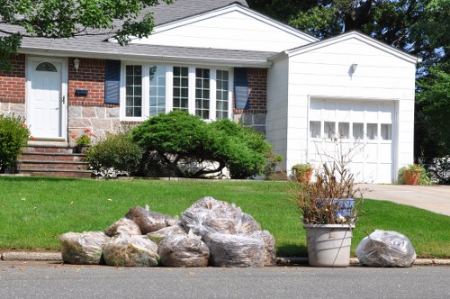 Professional garden clearance in Acton removing overgrown waste