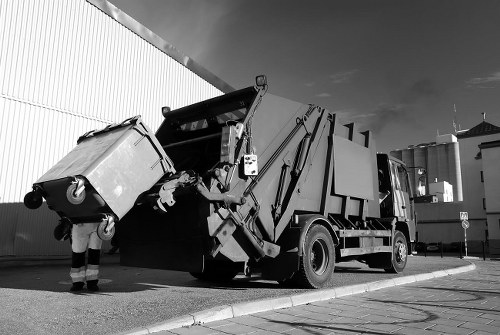 Professional sofa removal service handling bulky furniture in Acton