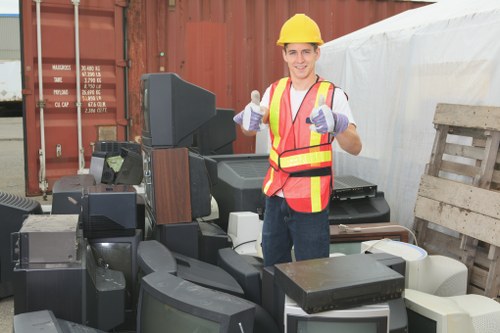 Waste removal team handling household clearance in Acton