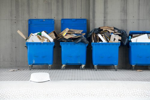 Furniture removal team collecting bulky household furniture in Acton