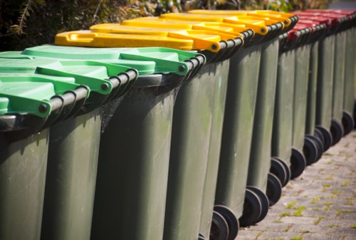 Council waste collection bins arranged on an Acton residential street