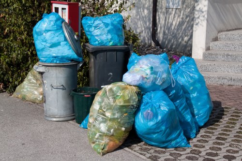 Residential outdoor rubbish removal in Acton