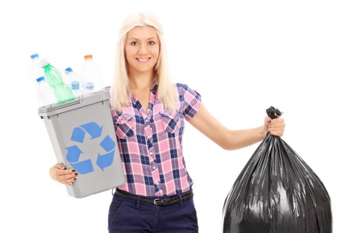 Supervisor reviewing risk controls during a rubbish removal job
