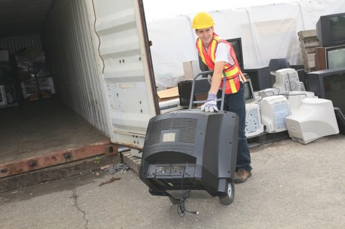Bulk waste and yard debris ready for trash collection in Acton